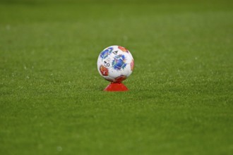 Adidas derby star game ball on hat, marker cap, on grass, soccer Bundesliga, Voith-Arena,