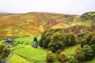 Autumn colors over Claerwen Dam, Claerwen Valley, Elan Valley Reservoir, Rhayader, Powys, Wales, UK