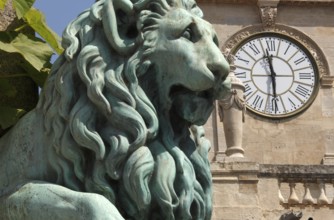 Bronze lion on the Place de la Republique in Arles, Bouches-du-Rhone, Provence, France
