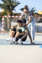 A Down syndrome teenager enjoys outdoor skateboarding with family support Laughter and joy fill the