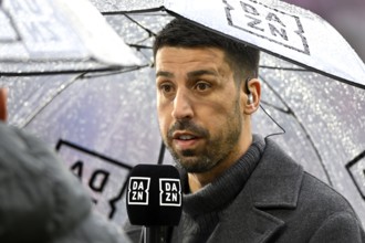 DAZN TV expert Sami Khedira interview with screen microphone Mikro Logo Rain, soccer Bundesliga,