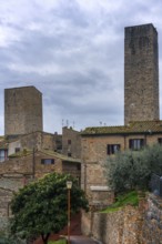 A panoramic view of San Gimignano, highlighting its famous medieval towers and traditional stone