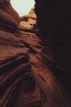 Striking volcanic landscape of Lanzarote, featuring rugged canyon formations with layered rock