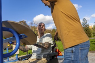 Friends enjoy a sunny day in the park, focusing on inclusive fitness for cerebral palsy One is