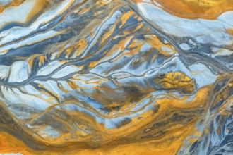 This image features an intricate multicolor abstract texture, showcasing vibrant blue and orange