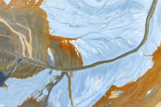 A vibrant abstract composition showcasing fluid textures in blue and orange shades The dynamic