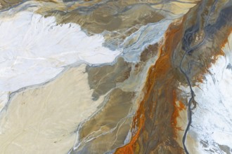 A vibrant abstract composition in earthy tones with flowing patterns, evoking natural landscapes