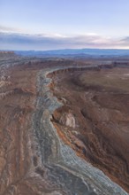 Stunning aerial view of Caineville Mesa in Utah, USA, showcasing vibrant layers of sedimentary rock