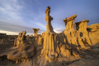 Stunning sandstone formations in Bisti De-Na-Zin Wilderness, New Mexico, captured at sunset These