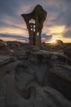 Dramatic rock formations in Bisti De-Na-Zin Wilderness, New Mexico, USA, are highlighted by the
