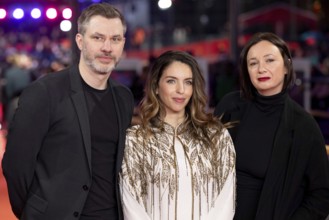 Rédéric Hambalek, Sofia Alaoui, Dorota on the Red Carpet in front of the closing gala of the 76th