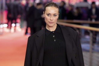 Sina Tkotsch on the Red Carpet in front of the closing gala of the 76th Berlinale at the Theater am