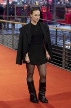 Sina Tkotsch on the Red Carpet in front of the closing gala of the 76th Berlinale at the Theater am