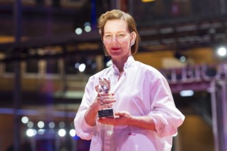 Sandra Hüller poses with the Silver Bear for the best acting performance in a leading role in the
