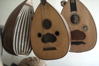 Istanbul, Turkey. April 13th 2017 Handmade Oud hanging inside the window display of Veysel Muzik