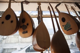 Handmade Oud hanging inside the window display of Veysel Muzik Evi, Istanbul. Produced by Cengiz