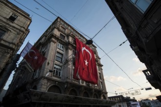 Istanbul, Turkey. July 2rd 2016 Turkish flag hanging from a European style building in the Beyoglu