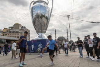 Istanbul, Turkey. June 9th 2023 Fans play football in Taksin square before the Champions League