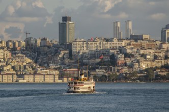 Istanbul, Turkey. August 19th 2014 A ferry crosses the Bosphorus towards Besiktas on the European
