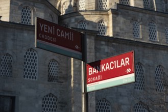 Street sign for Yeni Cami Caddesi and Bankacilar Sokagi behind the New Mosque in the Fatih district