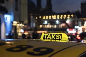 Istanbul Turkey. October 23rd 2021 Yellow Turkish Taxi Sign at night in Taksim Square Istanbul, the