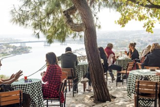Istanbul, Turkey. October 12th 2021 People enjoy Turkish tea and coffee and a view of the Golden