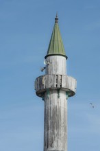 Istanbul, Turkey. 29th November 2020 Simple wooden minaret of old Turkish mosque, the call to