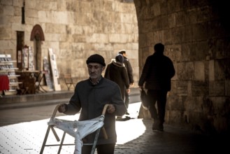 Istanbul, Turkey. November 21st 2023 A Turkish worker pushes a trolley cart near the Egyptian