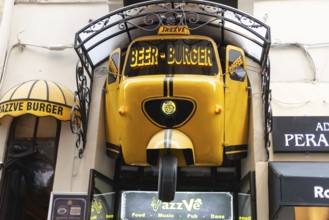 August 2nd 2021 Istanbul, Turkey Quirky Yellow Sign for Jazz Ve Beer and Burger Bar near Istiklal