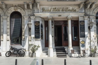 August 2nd 2021 Istanbul, Turkey An Antique motorbike parked outside The Grand Hotel de Londres in