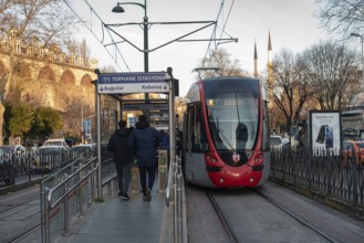 Istanbul, Turkey. December 25th 2021 Commuters catching a tram at Tophane station near Karakoy on