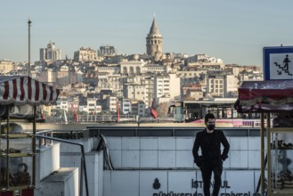 Istanbul, Turkey. November 28th 2020 A man wearing a surgical face mask in Istanbul, wearing masks