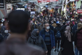 Istanbul, Turkey. November 28th 2020 Shoppers wearing face masks in a crowded Bazaar on the