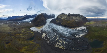 Aerial view of Vatnajokull Glacier, showcasing its expansive ice fields amidst rugged Icelandic