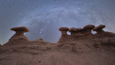 Goblin Valley State Park in Utah, USA, under a breathtaking Milky Way. The desert landscape