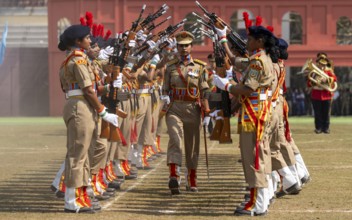 Women personnel of the Central Reserve Police Force (CRPF) perform a synchronised rifle drill