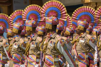 Central Reserve Police Force (CRPF) personnels march in ceremonial formation during a parade held