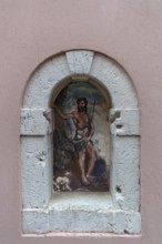 A fresco of saints in a niche, Venice, Veneto, Italy