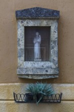 Saint figure in a niche, Venice, Veneto, Italy