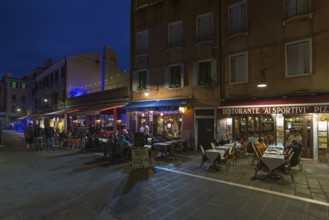 Restaurants and cafés in the evening, Venice, Veneto, Italy