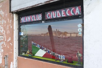 Reflection of Venice in the window of the Milan soccer club on the island of Giudecca, Veneto,