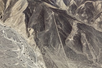 Desert hills with clearly recognizable line patterns and drawn shapes, the geoglyphs and drawings