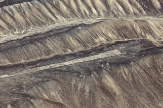 Geoglyphs of the Nazca on the sandy hills of Peru, seen from the air, The geoglyphs and paintings