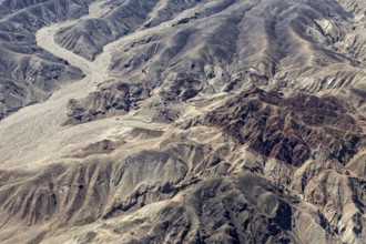 Detailed rock and mountain formations in a barren desert landscape, the desert landscape near Nasca
