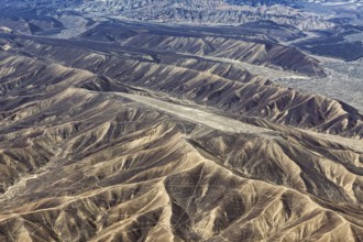 Hilly desert landscape with deep gorges and rock formations, The desert landscape near Nasca in