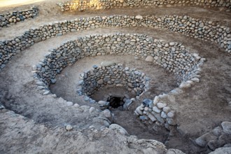 Large spiral structure of stones anchored in the earth, the ancient Nazca wells (puquios) near