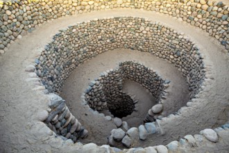 Stone spiral, which digs spirally into the ground, with evenly arranged stones, The ancient Nazca