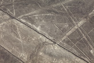 Lines and patterns form on a dry desert surface, the geoglyphs and drawings in the desert near
