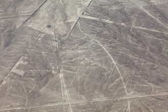 Geometric patterns of the Nazca lines in an arid desert region, seen from the air, The geoglyphs