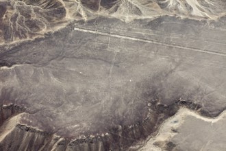 Aerial view of the Nazca Lines, with mysterious formations etched into the desert, the geoglyphs
